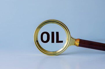 Barrels with the inscription Oil on the background of charts and quotes.