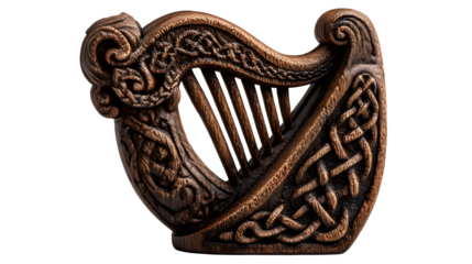 A small, carved wooden Irish harp with intricate Celtic knotwork. isolated on white background