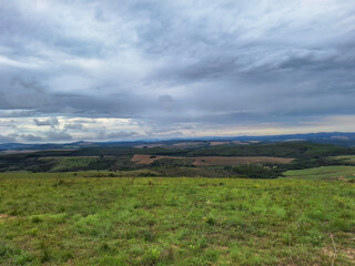 Naklejka premium landscape with mountains and clouds