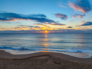 Sunrise Seascape Over Gentle Ocean Swells