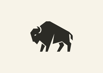 A simple geometric bison logo, symbolizing strength, resilience, and grounded power through clean angular lines