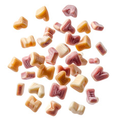 Scattered heart-shaped candies of various pastel colors against a black background