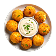 Overhead shot of a white plate with golden, spherical appetizers arranged around a creamy dip