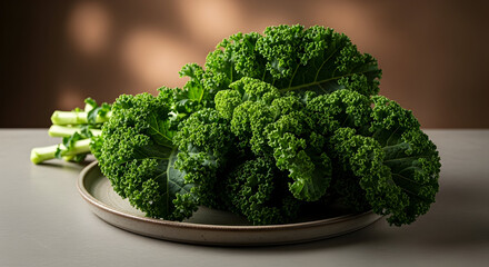 Bunch of fresh curly green kale leaves on a rustic plate, illuminated by warm natural light and shadows, wholesome food