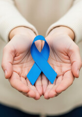 Hands Holding Blue Ribbon for World Diabetes Day Awareness