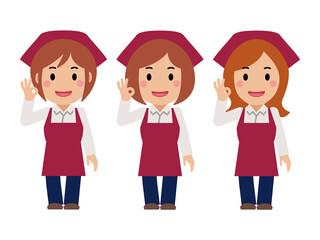 笑顔でOKサイン。真紅のエプロンと三角巾の女性