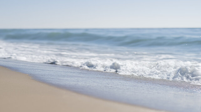 A serene beach scene with gentle waves and an empty shoreline, evoking tranquility.