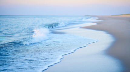 A serene beach scene with gentle waves and an empty shoreline, evoking tranquility.