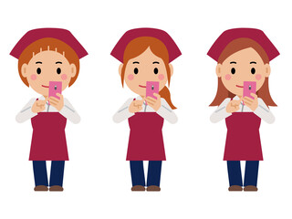 スマホを操作する真紅のエプロンと三角巾の女性。その2