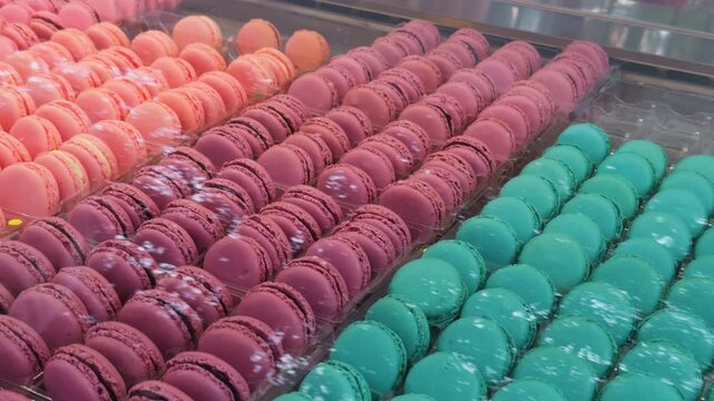 A Colorful Display of Exquisite Macarons in a Charming Pastry Shop Close Up 4K Footage, Perfect for Food Lovers