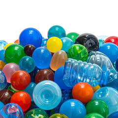 A vibrant collection of colorful spheres and a water bottle against a black background