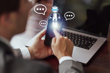 Person using modern smartphone with chatbot