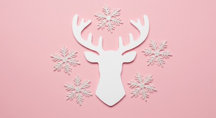 White reindeer silhouette surrounded by snowflakes on pink background