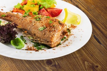 Tasty fresh cooked fish beautifully plated
