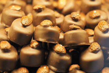 Delightful chocolate candies with almond toppings displayed