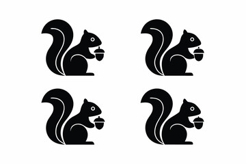 set of Squirrel holding acorn icon, autumn forest animal silhouette vector illustration