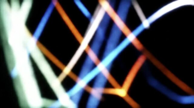 Abstract digital art featuring glowing lines of various colors, creating dynamic patterns and visual effects, ideal for backgrounds and artistic projects