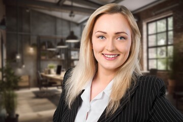 Fototapeta premium Confident beautiful business leader posing in office