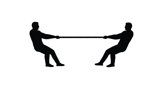 Silhouette of two teams in a dynamic tug of war competition pulling a rope in opposite directions demonstrating strength and conflict