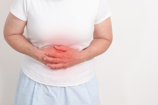 Elderly woman having abdomen aches for Stomach pain, digestion with constipation or Diarrhea from food poisoning, female problem and Endometriosis, Hysterectomy, Stomachache and Menstrual concept