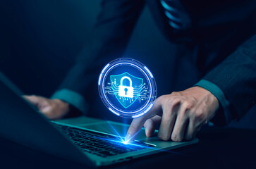 Businessman pressing laptop key with security padlock icon, representing cybersecurity, data protection, privacy, and digital safety. Concept of secure network, information technology, online access.