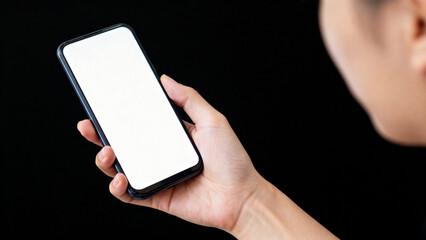 Person holding smartphone with blank screen