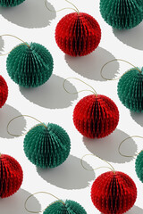 Paper Christmas Ornaments as round balls, hanging crafted eco-friendly diy New Year decorations. Minimal aesthetic holidays non seamless repeat pattern, top view of red and green baubles