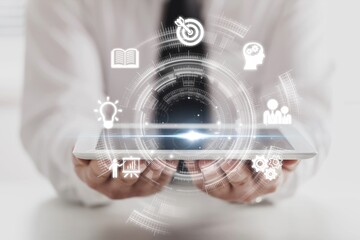 Skills Development. Businessman hold digital icons