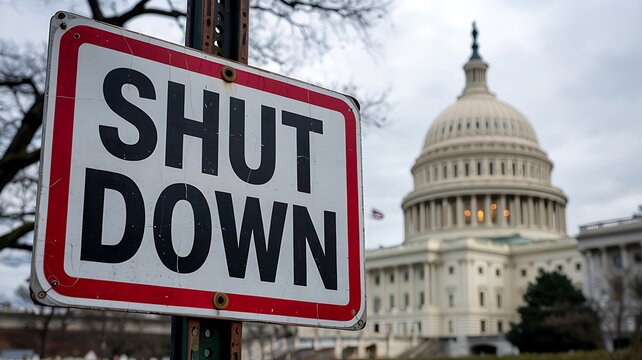 Government shutdown sign in front of the united states capitol building symbolizing a halt in federal operations and political impasse