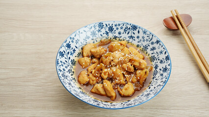 Teriyaki Chicken with onion, soy sauce, butter and sesame seeds