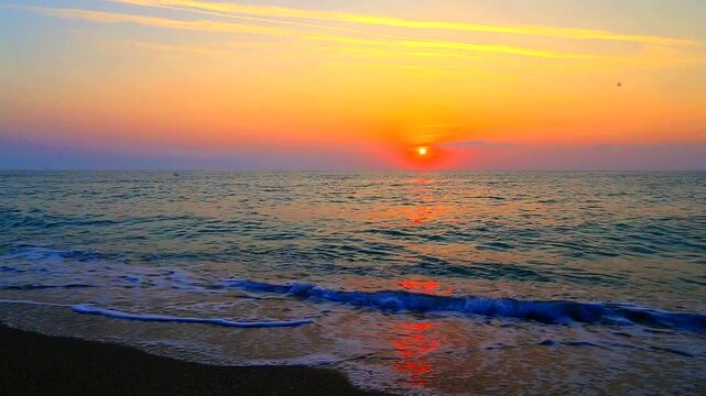 Beautiful summer sunrise over the beach