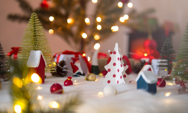 Beautiful christmas decorations with blurred christmas tree lights background.