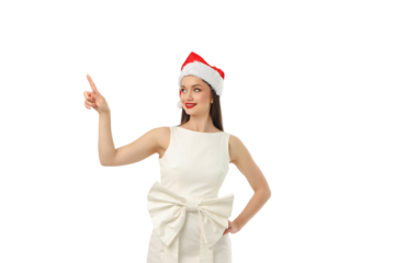 Woman in a festive Santa hat pointing with a smile, isolated, PNG