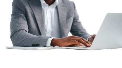 a person in a suit sits using laptop isolated on white background