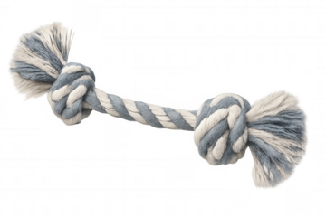 Isolated dog rope toy featuring knots and fringes, perfect for pets to chew, play, and train with