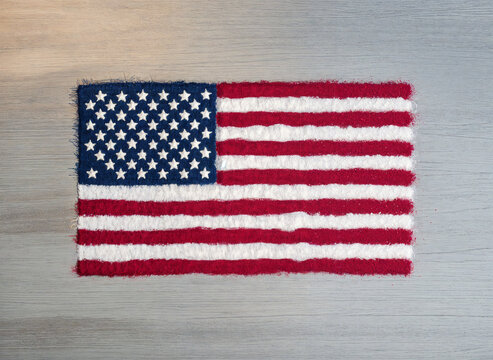 Textured American Flag on Wooden Background &ndash; Patriotic USA Concept