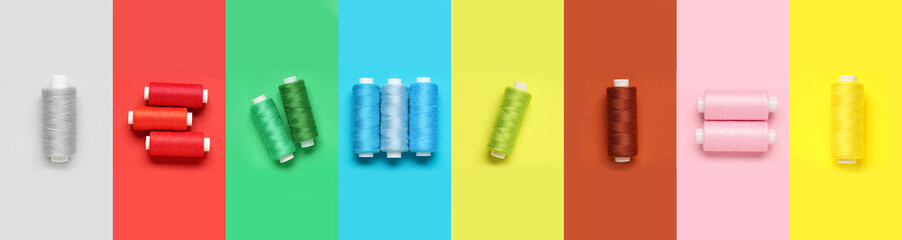 Set of many different threads on color background, top view
