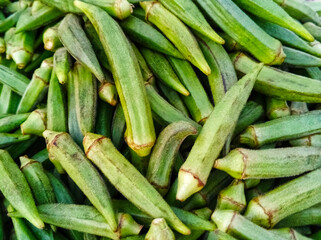 top view of Fresh okra also known as (Lady finger) on the market in Pakistan. Close-up.