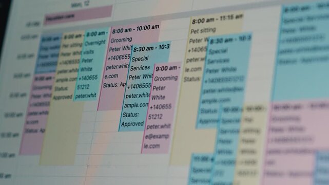A laptop showing an online calendar packed with appointments, illustrating busy schedules and digital organisation.