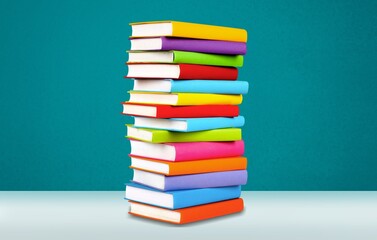 Stack of reading colorful books on blue background