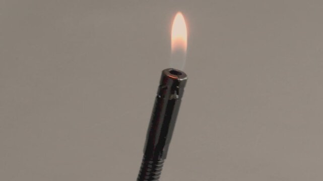 A convenient gas lighter for the stove and fireplace for easy use in the kitchen