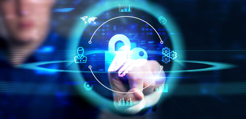 Cyber security data protection business technology privacy concept. Young businessman  select the icon security on the virtual display.