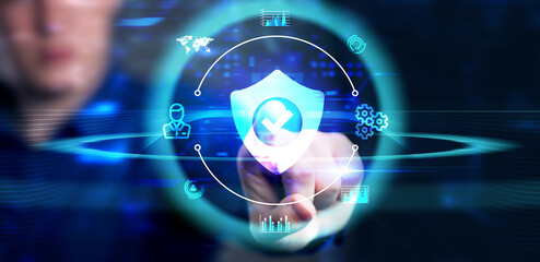 Cyber security data protection business technology privacy concept. Young businessman  select the icon security on the virtual display.