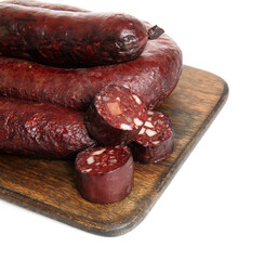 Cutting board with delicious blood sausage isolated on white background