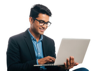 Young indian businessman smiling while typing on a laptop computer isolated on transparent background