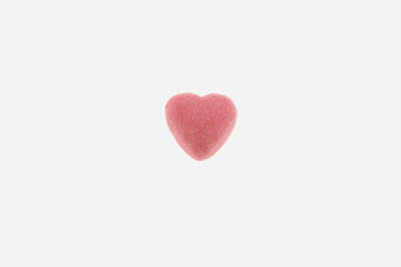 single pink heart candy, single pink heart, sweet Valentine’s day concept, romantic background design, pink heart candy mockup on white, affection, love, care, pink candy, isolated on white background