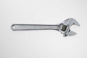 premium adjustable wrench, for both professional mechanics, metal wrench for plumbing and mechanics, automotive repair, household repair equipment, metal tool photography, isolated on white background