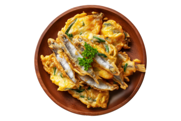 Whitebait Fritters small fish mixed with egg and fried like pancakes on wooden plate, isolated on white transparent background. Concept of New Zealand cuisine