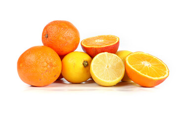 Group of lemons and oranges isolated on a white background
