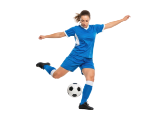 Female soccer player kicking ball isolated on transparent background
